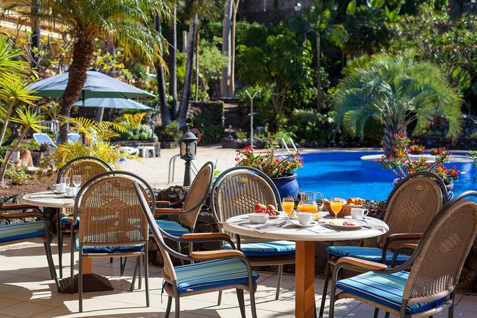 Imagen del bar/restaurante del Apartahotel Tigaiga Suites. Foto 3