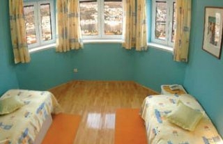 Imagen de la habitación del Apartahotel Villa Curic. Foto 7