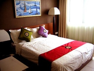 Imagen de la habitación del Apartahotel Yuhai Int'l Resort&Suites. Foto 4