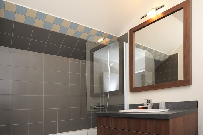 Imagen de la habitación del Apartahotel Zenitude H&ocirc;tel R&eacute;sidences Roissy Village. Foto 15