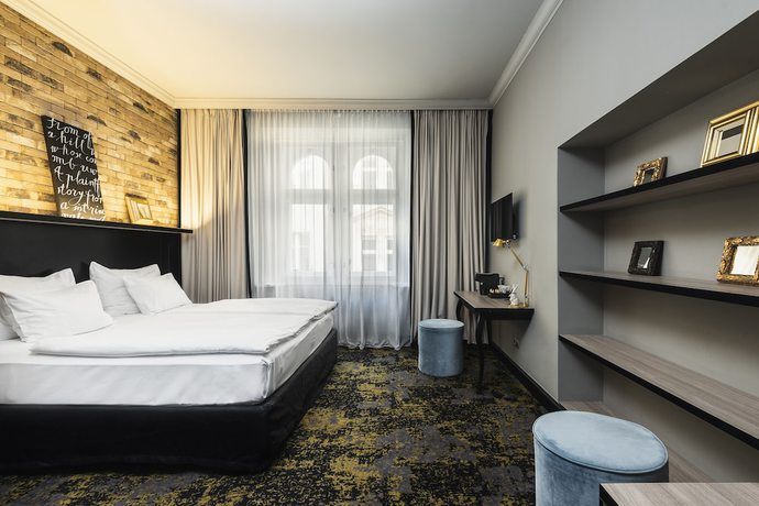 Imagen de la habitación del Apartahotel numa l Root Rooms & Apartments. Foto 8