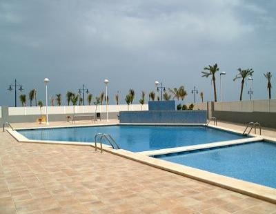 Imagen de la piscina del Apartamentos ARGENTA CALETA APARTAMENTOS. Foto 9