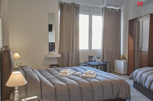 Imagen de la habitación del Apartamentos ATHENS COMMERCIAL. Foto 7