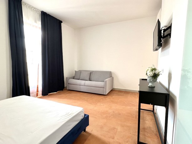 Imagen de la habitación del Apartamentos Abitatt Apart-Suite. Foto 10