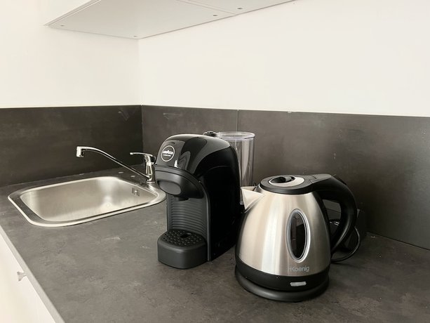Imagen de la habitación del Apartamentos Abitatt Apart-Suite. Foto 13