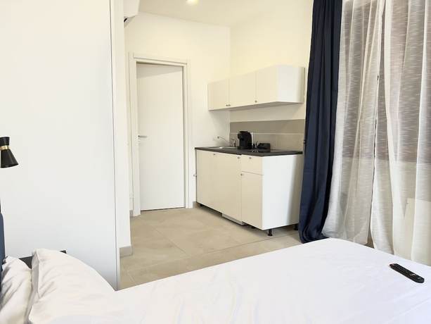 Imagen de la habitación del Apartamentos Abitatt Apart-Suite. Foto 16