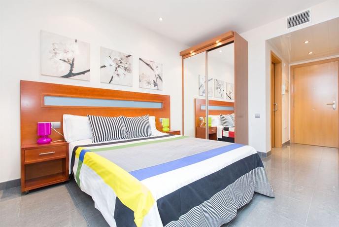 Imagen de la habitación del Apartamentos AinB Universitat. Foto 8