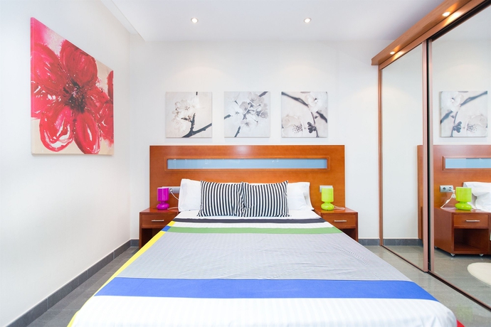 Imagen de la habitación del Apartamentos AinB Universitat. Foto 11