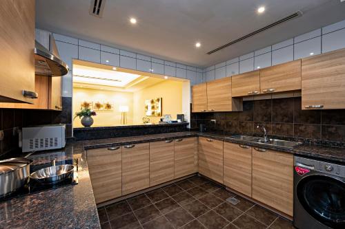 Imagen de la habitación del Apartamentos Al Gassar Resort. Foto 11