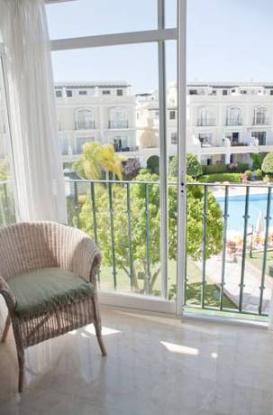 Imagen de la habitación del Apartamentos Aloha Gardens. Foto 11