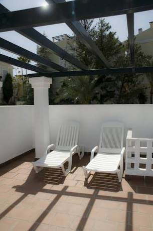 Imagen de la habitación del Apartamentos Aloha Gardens. Foto 15