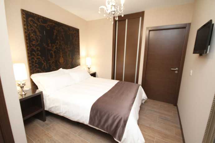 Imagen de la habitación del Apartamentos Alvear Suites. Foto 5