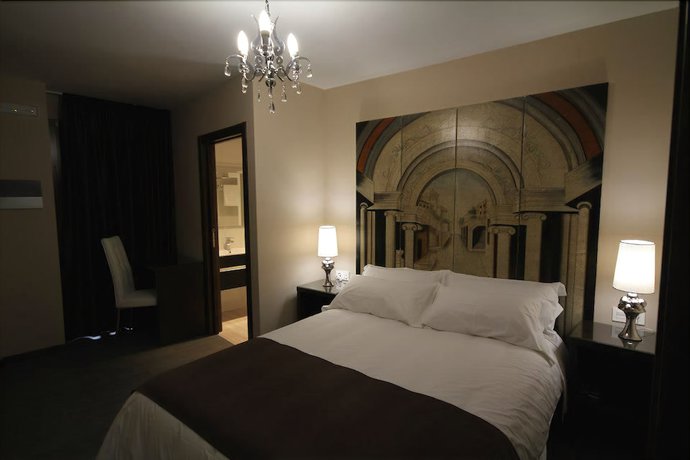 Imagen de la habitación del Apartamentos Alvear Suites. Foto 7