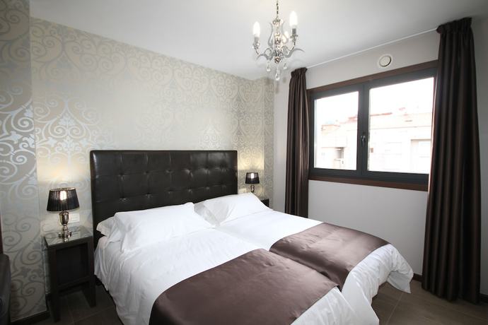 Imagen de la habitación del Apartamentos Alvear Suites. Foto 12