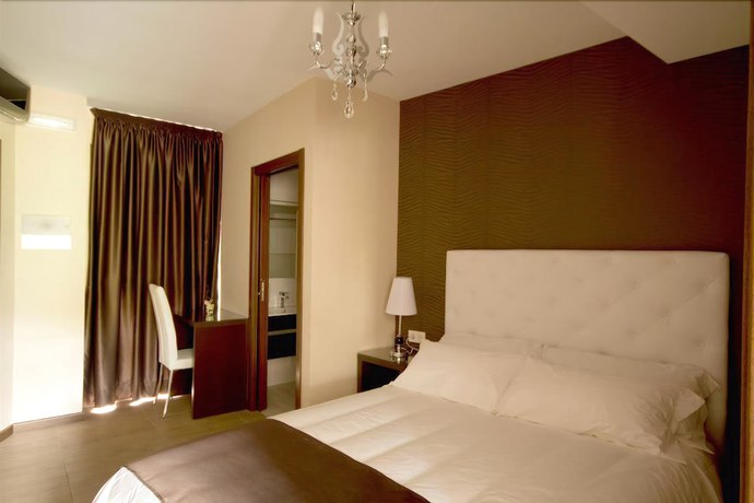 Imagen de la habitación del Apartamentos Alvear Suites. Foto 15