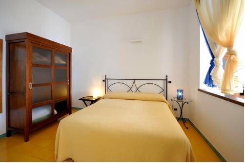 Imagen de la habitación del Apartamentos Amalfi Residence. Foto 7