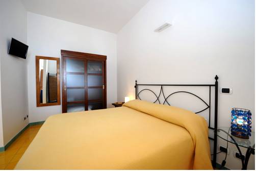 Imagen de la habitación del Apartamentos Amalfi Residence. Foto 9