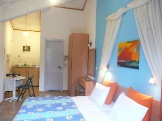 Imagen de la habitación del Apartamentos Amalthia Studios. Foto 12