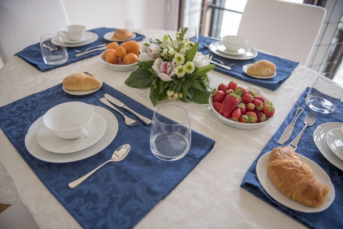 Imagen del bar/restaurante del Apartamentos Andree Canal Grande. Foto 2