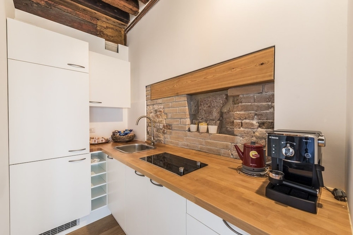 Imagen del bar/restaurante del Apartamentos Andree Canal Grande. Foto 3