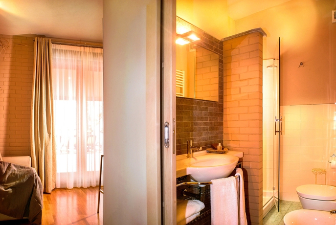 Imagen de la habitación del Apartamentos Anfiteatro Apartments. Foto 7