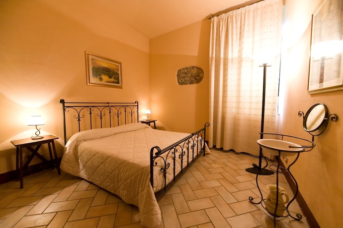 Imagen de la habitación del Apartamentos Antico Borgo Poggiarello. Foto 9