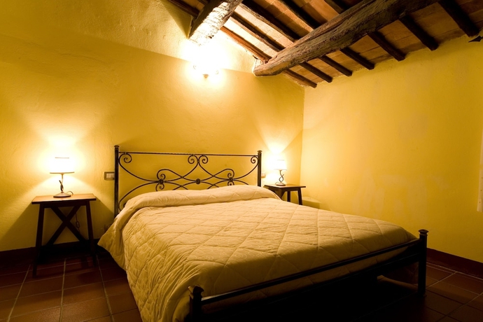 Imagen de la habitación del Apartamentos Antico Borgo Poggiarello. Foto 11