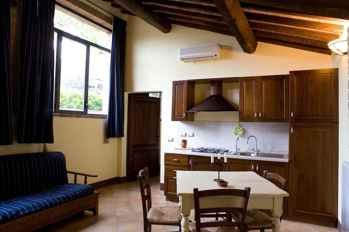 Imagen de la habitación del Apartamentos Antico Borgo Poggiarello. Foto 17