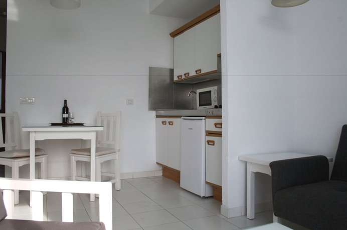 Imagen de la habitación del Apartamentos Apartahotel Costa Volcán. Foto 10