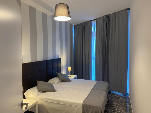 Imagen de la habitación del Apartamentos Apartamentos La Aldea Suites. Foto 3