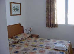 Imagen de la habitación del Apartamentos Apartamentos La Giralda. Foto 2