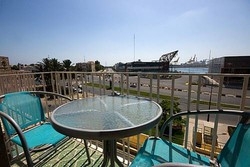 Imagen de los exteriores del Apartamentos Apartamentos Marina Port. Foto 10