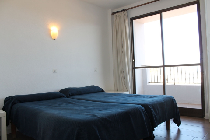 Imagen de la habitación del Apartamentos Apartaments La Perla Negra. Foto 2