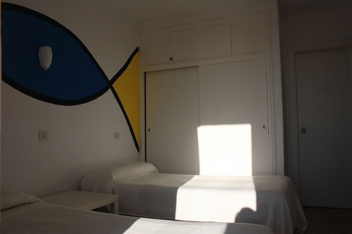 Imagen de la habitación del Apartamentos Apartaments La Perla Negra. Foto 3