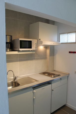 Imagen de la habitación del Apartamentos Apartaments La Perla Negra. Foto 7