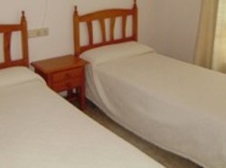 Imagen de la habitación del Apartamentos Apartaments l'Arrel. Foto 2