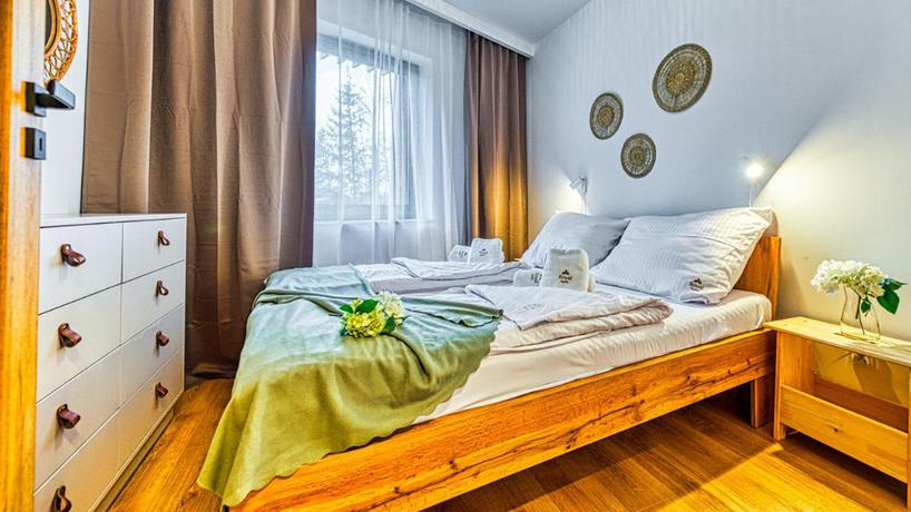 Imagen de la habitación del Apartamentos Apartamenty z basenem ROYAL APARTS VIP Stone Hill Centrum z jacuzzi i saunami - widokowe. Foto 4
