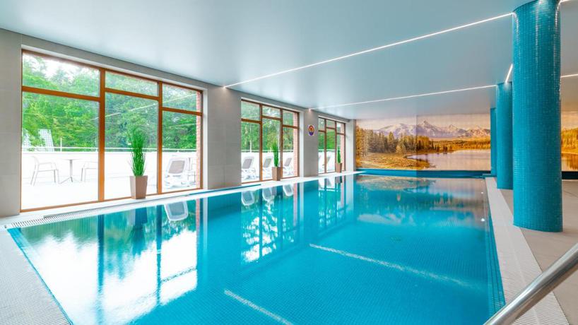 Imagen de la piscina del Apartamentos Apartamenty z basenem ROYAL APARTS VIP Stone Hill Centrum z jacuzzi i saunami - widokowe. Foto 11