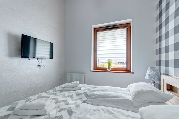 Imagen de la habitación del Apartamentos Apartments Nowa Motława Gdańsk by Noclegi Renters. Foto 11