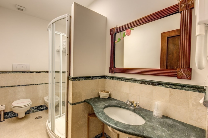 Imagen de la habitación del Apartamentos Apollo Apartments Colosseo. Foto 17