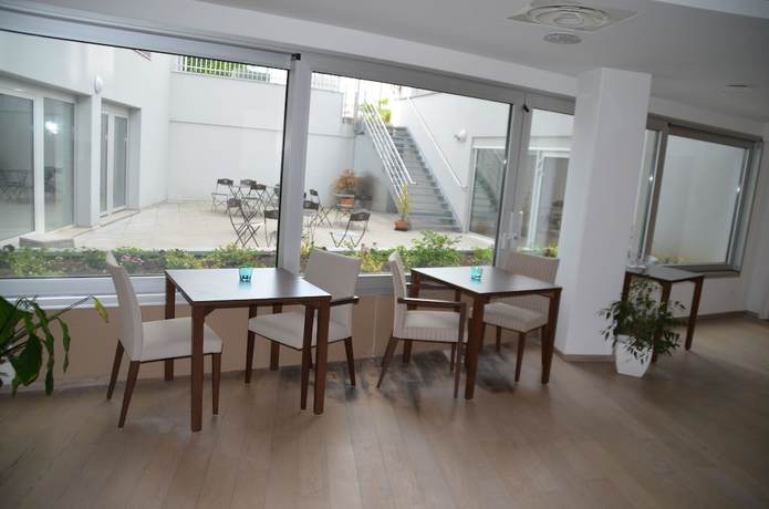 Imagen del bar/restaurante del Apartamentos Appart du Trident. Foto 2