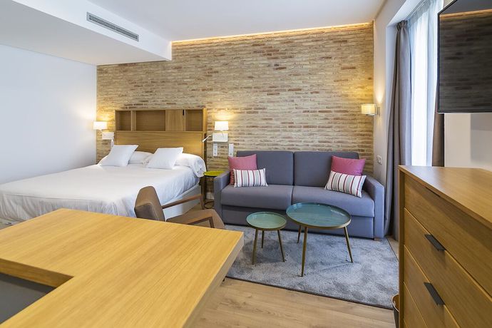 Imagen de la habitación del Apartamentos Aquitania Home Suites. Foto 2