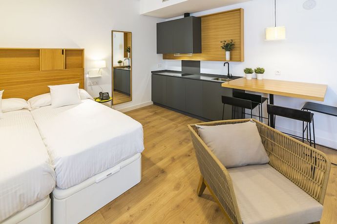 Imagen de la habitación del Apartamentos Aquitania Home Suites. Foto 9