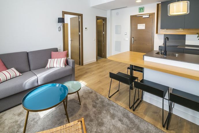 Imagen de la habitación del Apartamentos Aquitania Home Suites. Foto 10