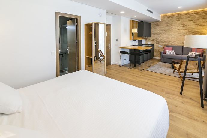 Imagen de la habitación del Apartamentos Aquitania Home Suites. Foto 11