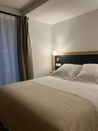 Imagen de la habitación del Apartamentos Arenas Suites. Foto 2