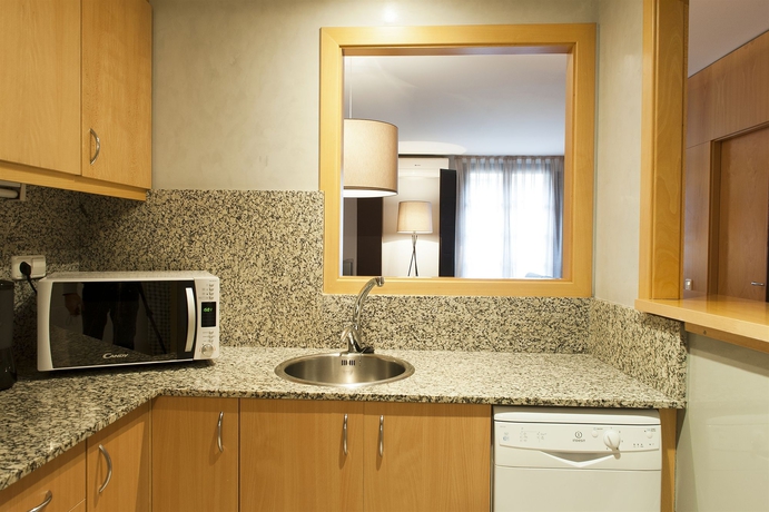 Imagen de la habitación del Apartamentos Aspasios Plaza Real Apartments. Foto 12