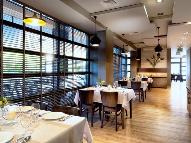 Imagen del bar/restaurante del Apartamentos Atrium Apartamenty. Foto 2