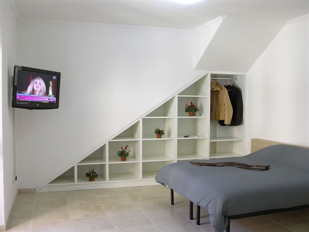 Imagen de la habitación del Apartamentos Aurelia Vatican Apartments. Foto 7