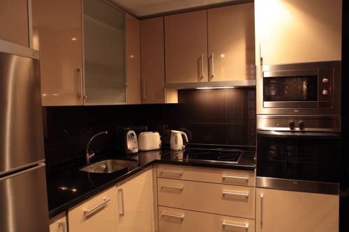 Imagen de la habitación del Apartamentos Bahía Boutique. Foto 9